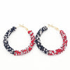 Boucles d'oreilles créoles Rasta noire et rouge | Rasta Lion